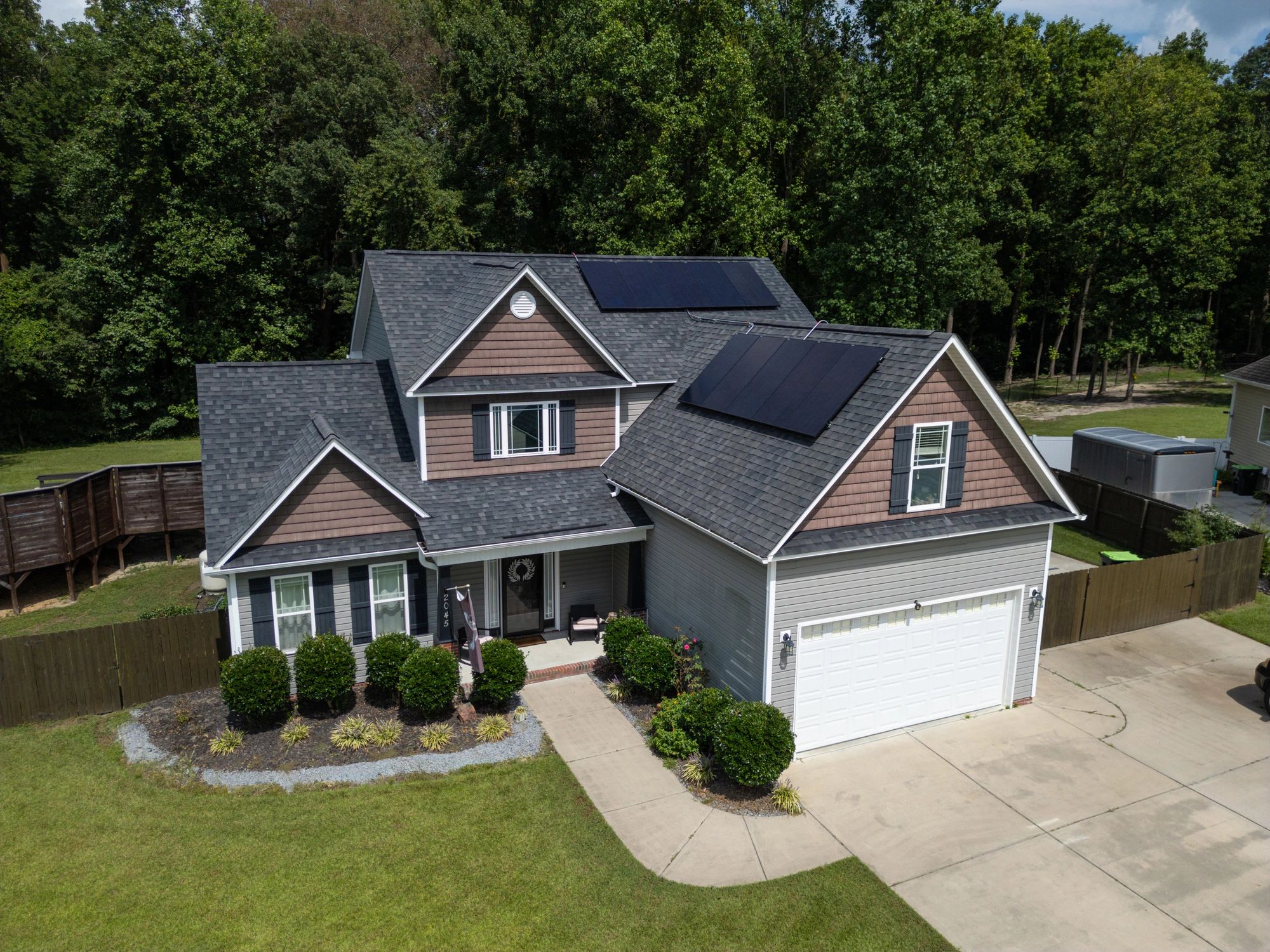 Exterior home improvement project with updated siding