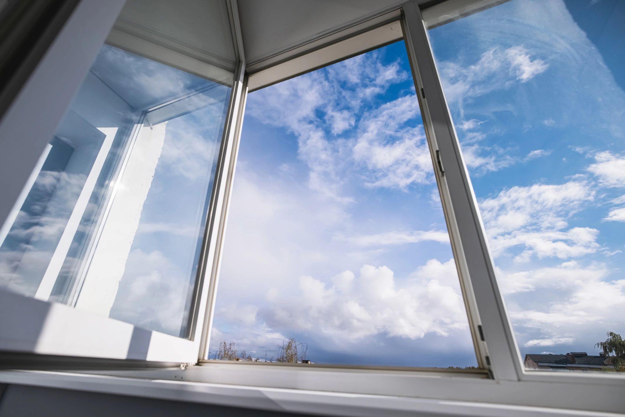Open window symbolizing comfort and energy efficiency